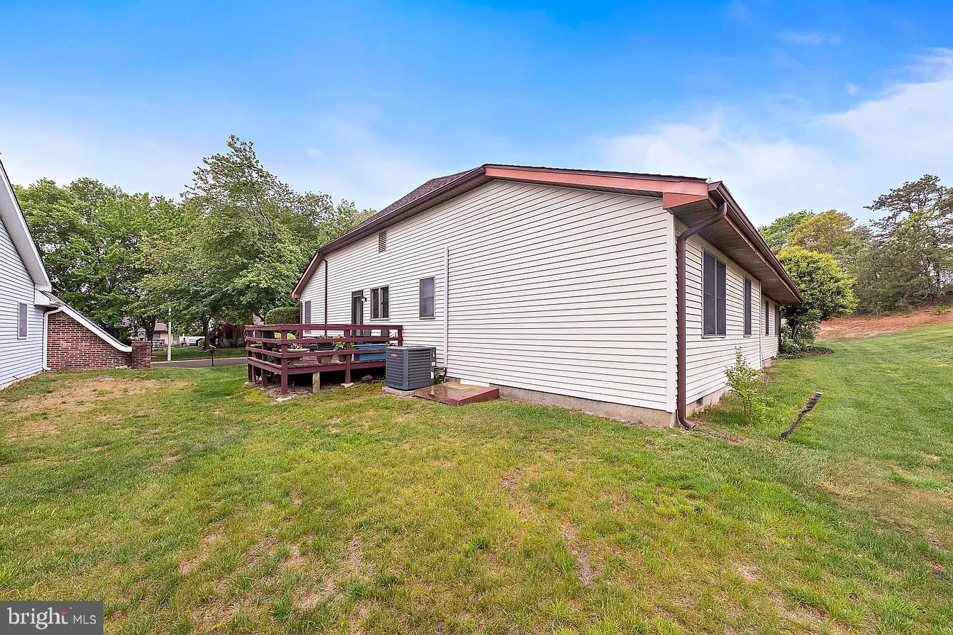 22 Fir Road Manahawkin, NJ 08050 - Photo 30 of 35 a view of a house with backyard