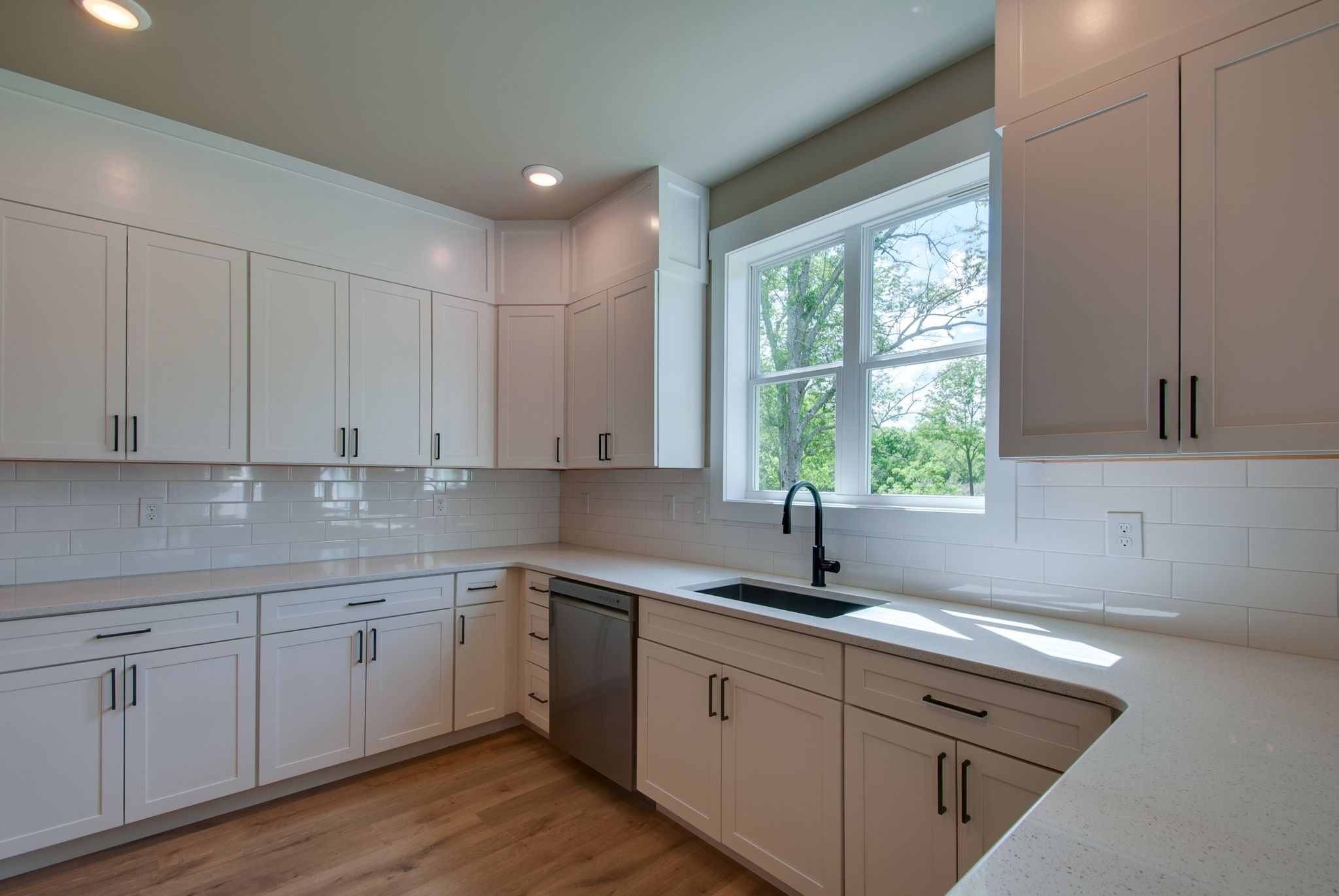 1151 Canaan Road Columbia, TN 38401 - Photo 14 of 40 a kitchen with sink cabinets and window