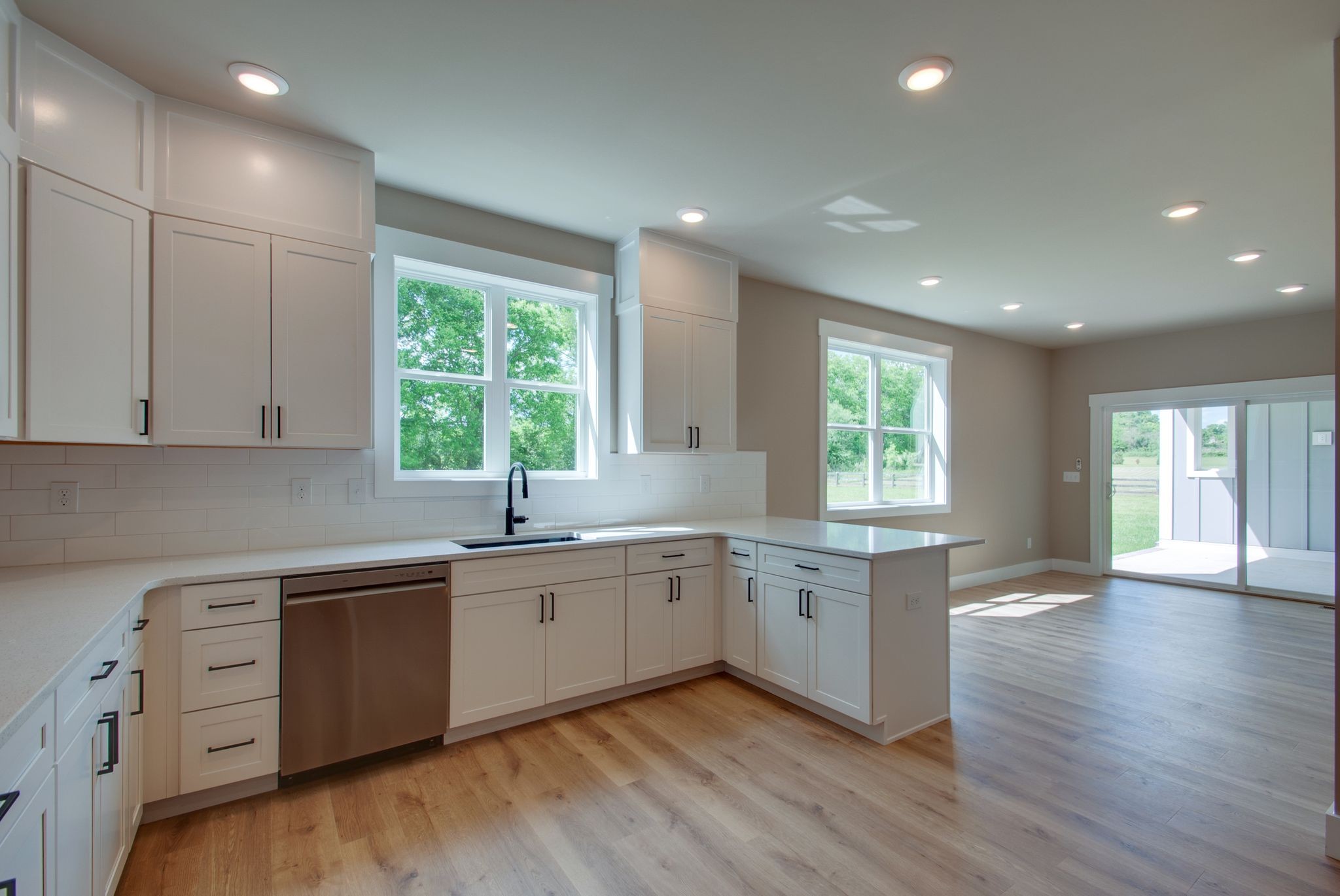 1151 Canaan Road Columbia, TN 38401 - Photo 16 of 40 a kitchen with a sink window and cabinets