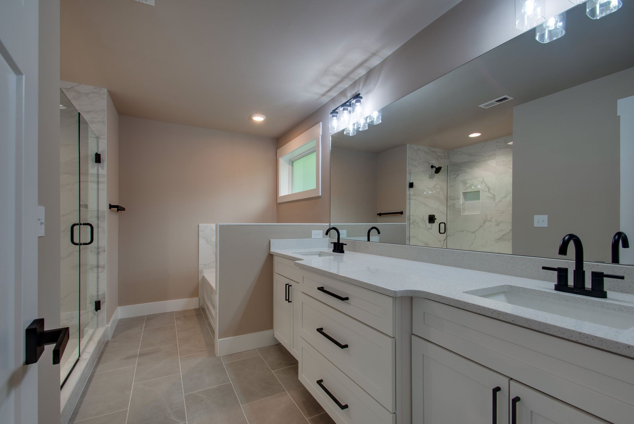 1151 Canaan Road Columbia, TN 38401 - Photo 24 of 40 a spacious bathroom with a double vanity sink mirror and shower