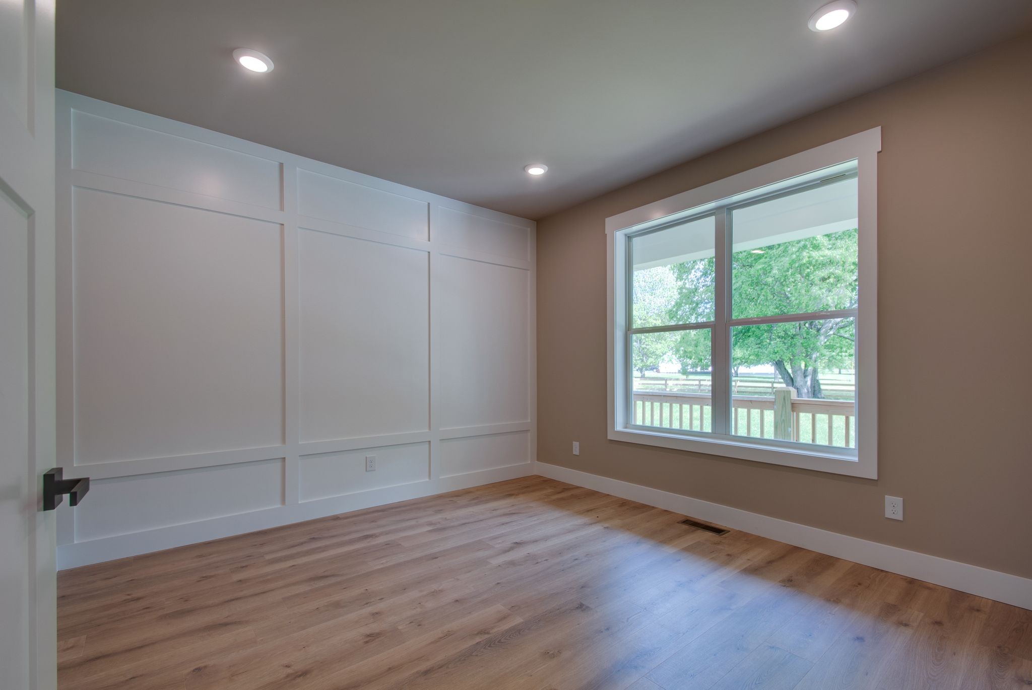 1151 Canaan Road Columbia, TN 38401 - Photo 6 of 40 an empty room with wooden floor and windows