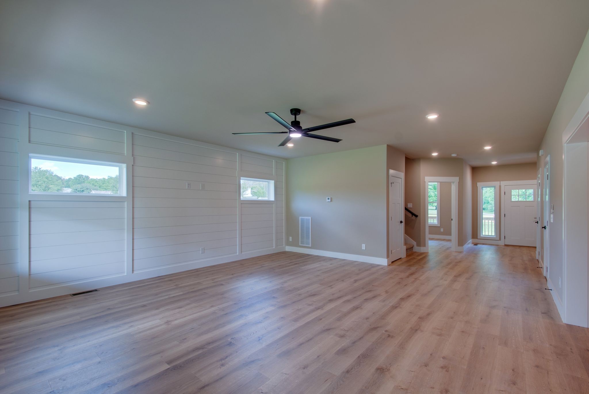 1151 Canaan Road Columbia, TN 38401 - Photo 9 of 40 wooden floor in an empty room with a window