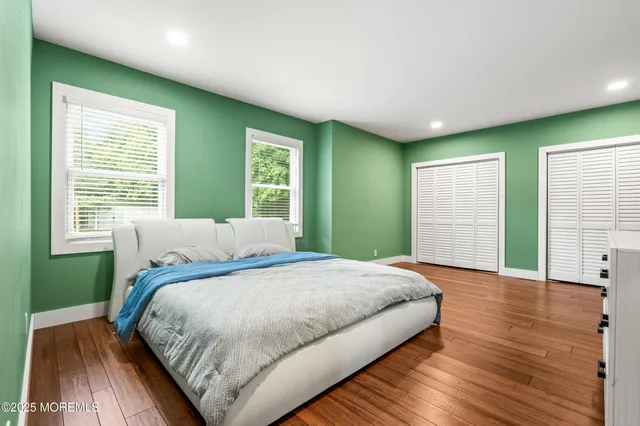 a room with a bed and a window