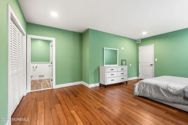 a view of a patio with a table and chairs