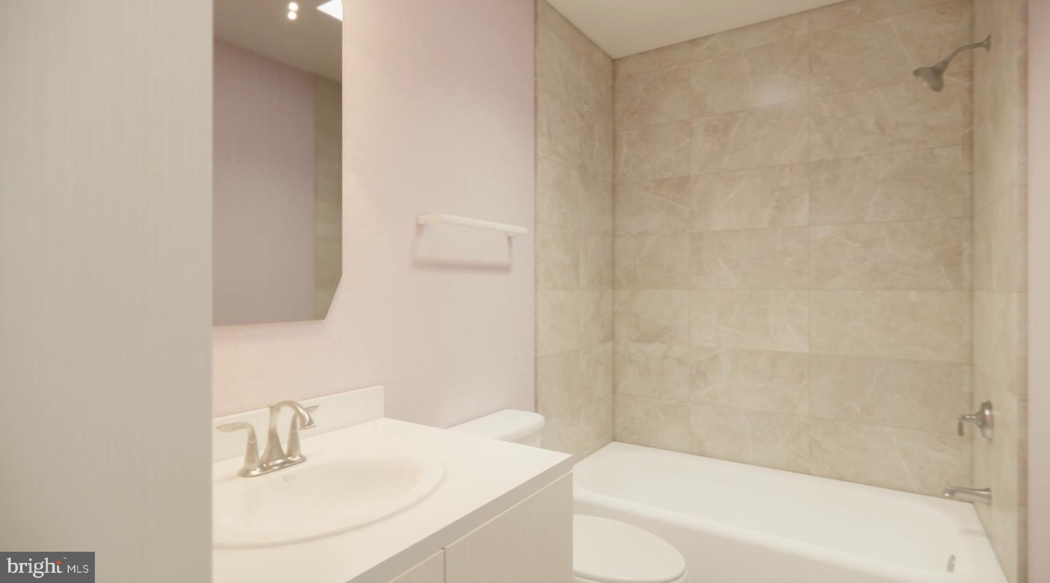 8007 Mandan Road, Unit 203 Greenbelt, MD 20770 - Photo 22 of 25 a bathroom with a sink and a bathtub