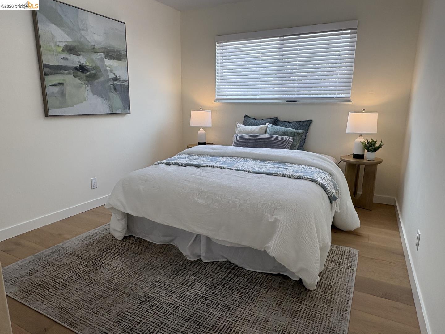 1728 Seventh Street, Unit A Berkeley, CA 94710 - Photo 3 of 5 a bedroom with a bed and a window