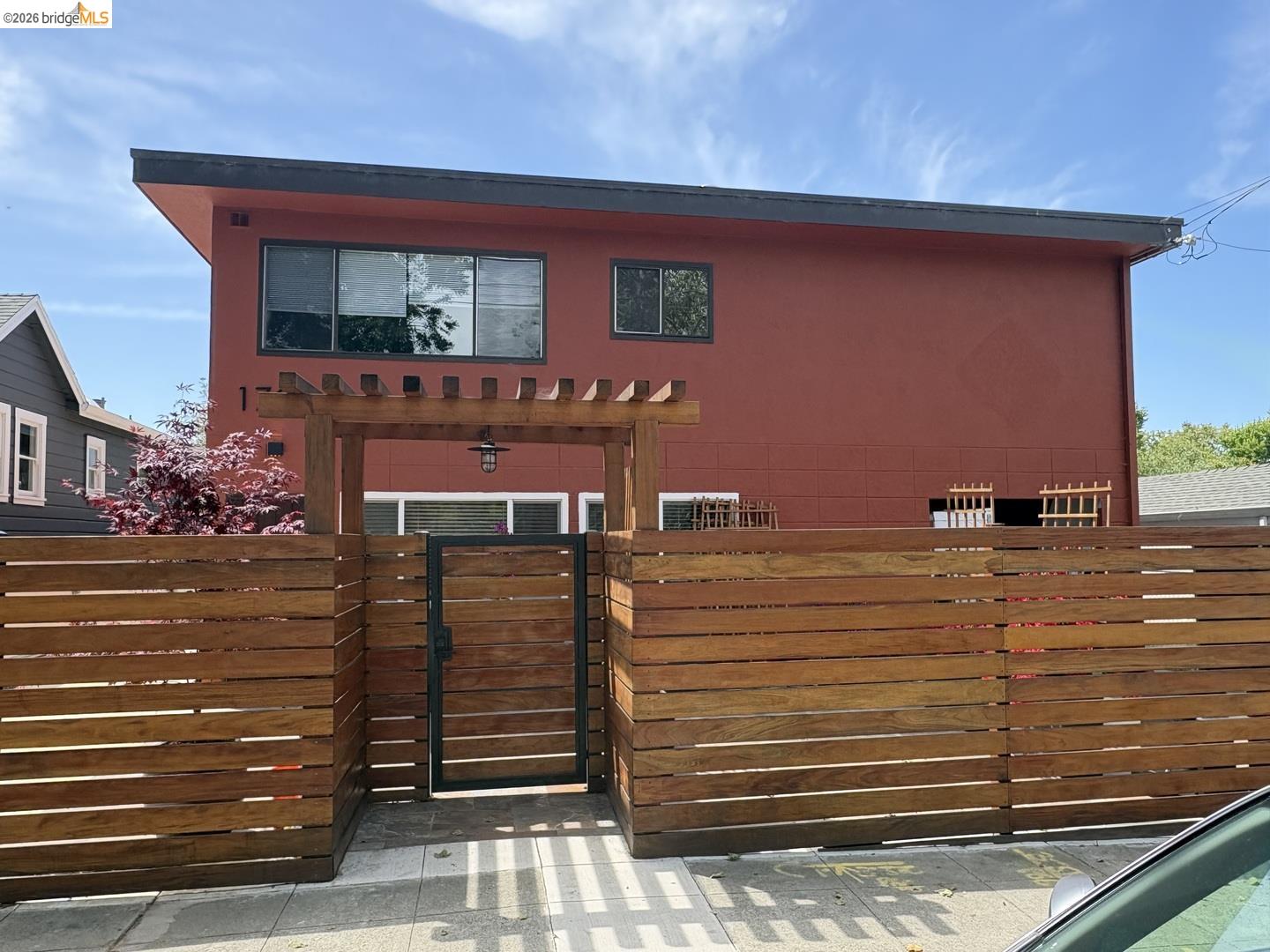 1728 Seventh Street, Unit A Berkeley, CA 94710 - Photo 5 of 5 a balcony view with a bench