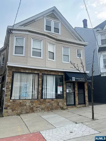 a living room with a couch and a large window