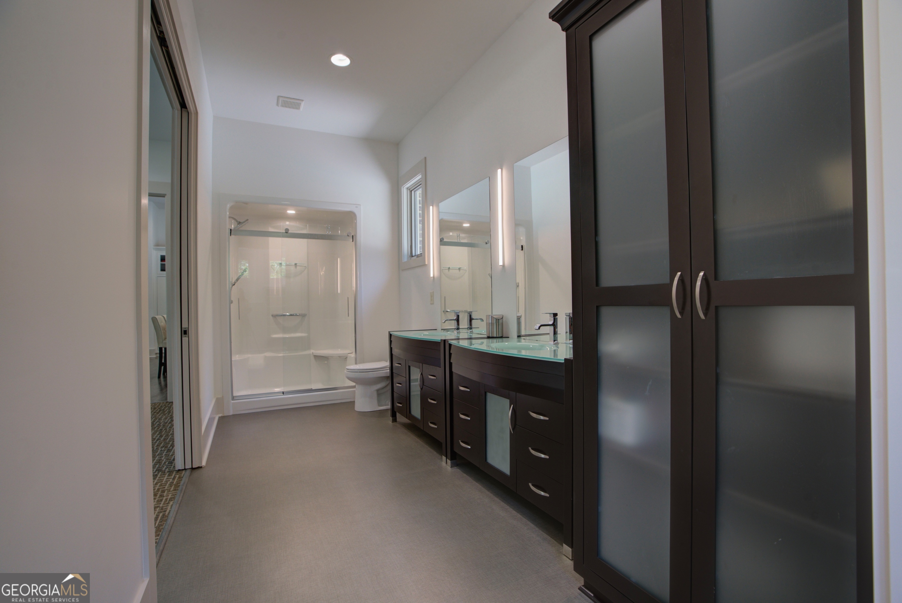 610 Kings Bridge Road Cave Spring, GA 30124 - Photo 21 of 72 a bathroom with a double vanity sink a toilet and shower