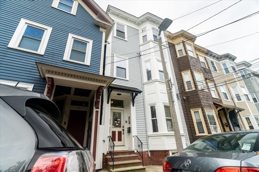 245 West Fifth Street, Unit 2 Boston, MA 02127 - Photo 25 of 34 a view of a building with a car parked car