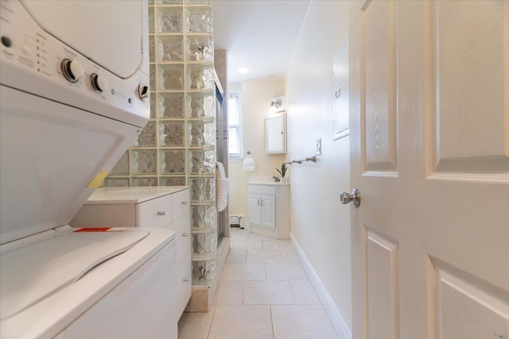 245 West Fifth Street, Unit 2 Boston, MA 02127 - Photo 8 of 34 a bathroom with a sink and shower