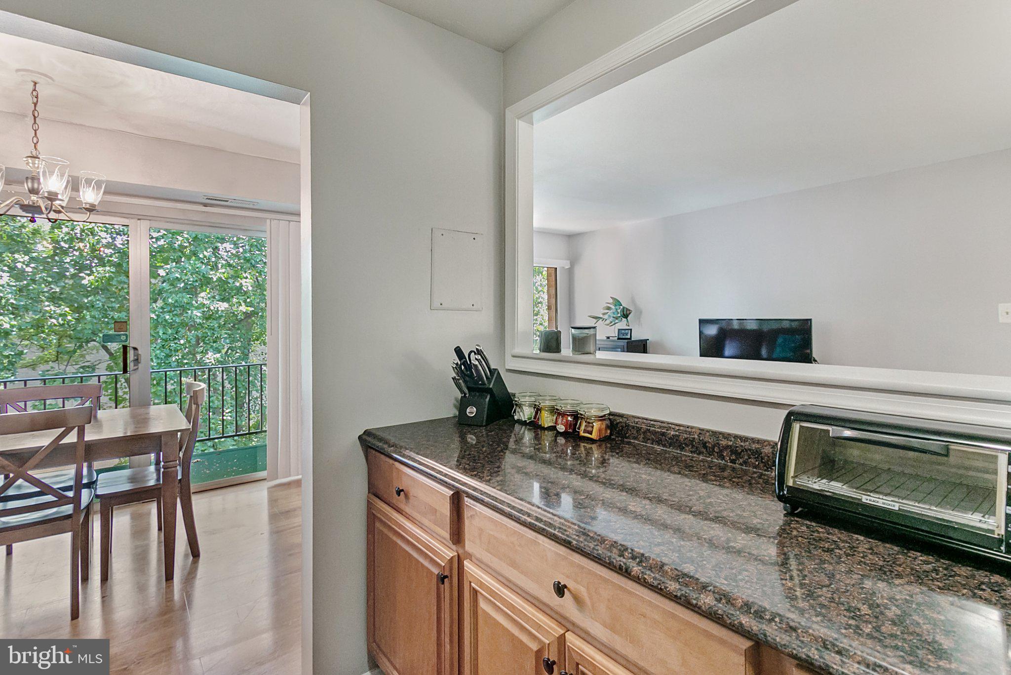 3750 Bel Pre Road, Unit 11 Silver Spring, MD 20906 - Photo 15 of 27 a bathroom with a sink and a mirror
