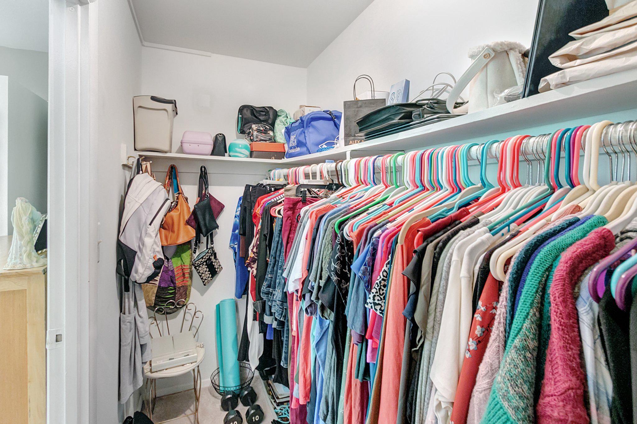 3750 Bel Pre Road, Unit 11 Silver Spring, MD 20906 - Photo 20 of 27 a view of walk in closet with clothes and shoes