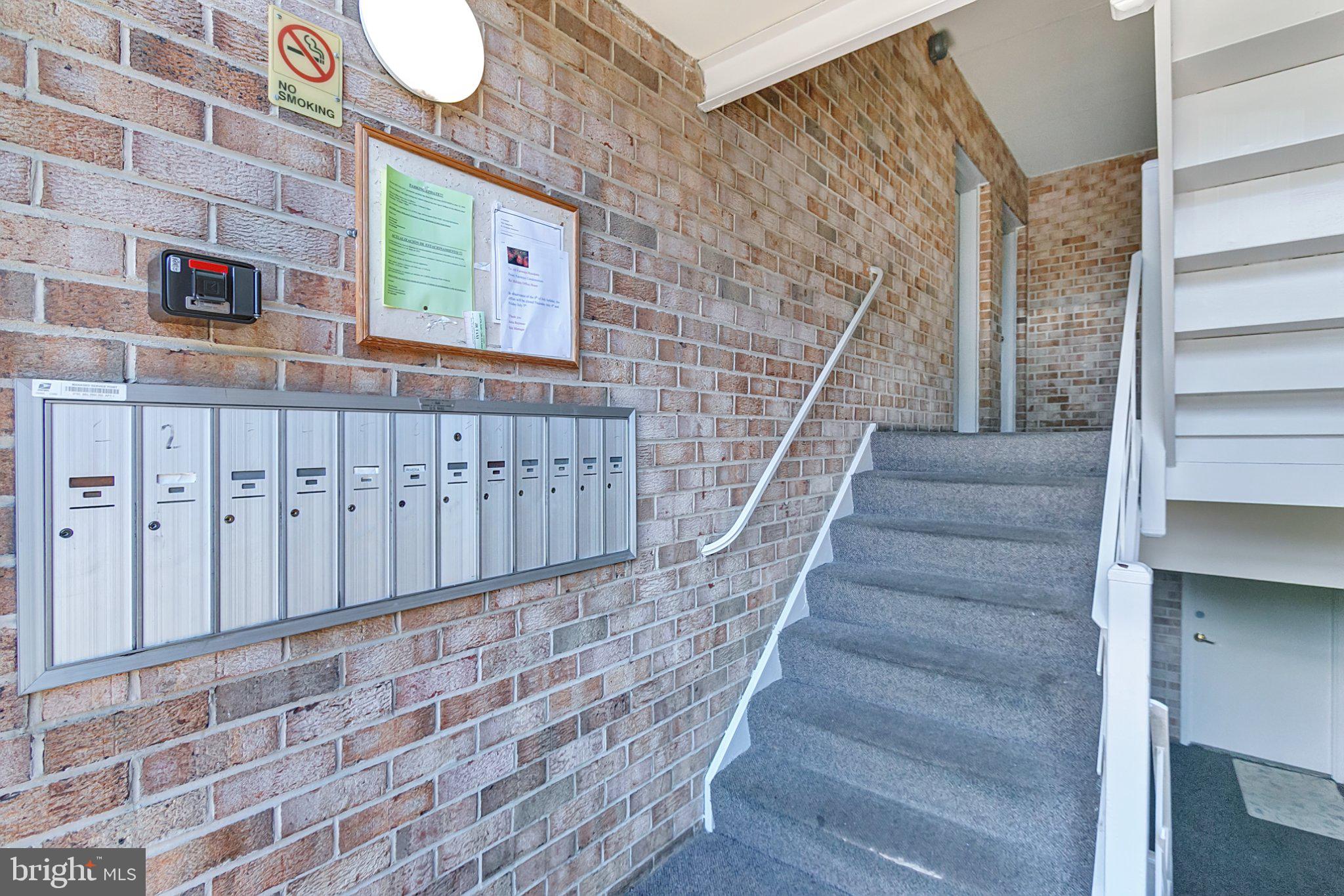 3750 Bel Pre Road, Unit 11 Silver Spring, MD 20906 - Photo 2 of 27 a view of an entryway with staircase