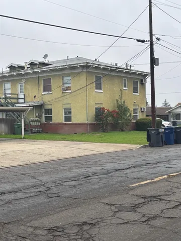 a view of a backyard with lake view