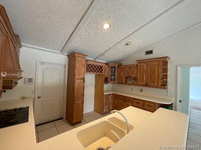 8699 Southwest Tropical Avenue Stuart, FL 34997 - Photo 4 of 15 Gallery Image 4