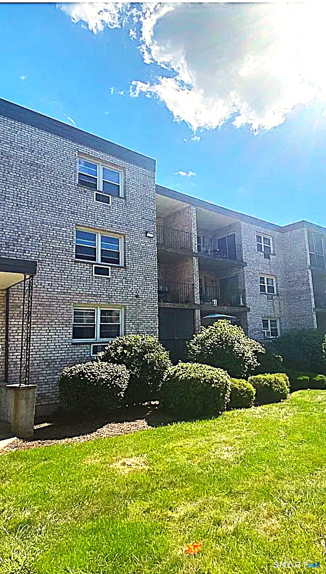 308 Meadowside Road, Unit 212 Milford, CT 06460 - Photo 8 of 8 a view of a house with a garden