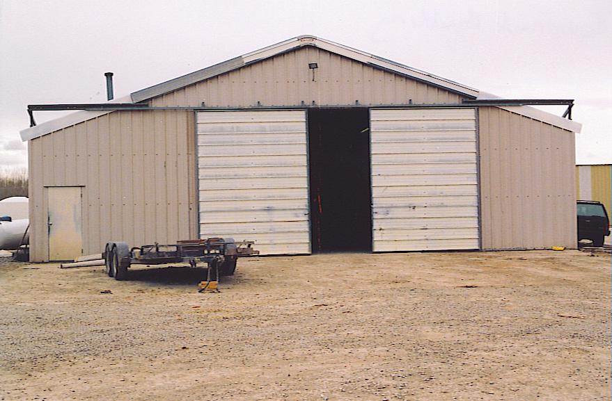62676 Ida Road Montrose, CO 81401 - Photo 3 of 9 a view of a house with a backyard