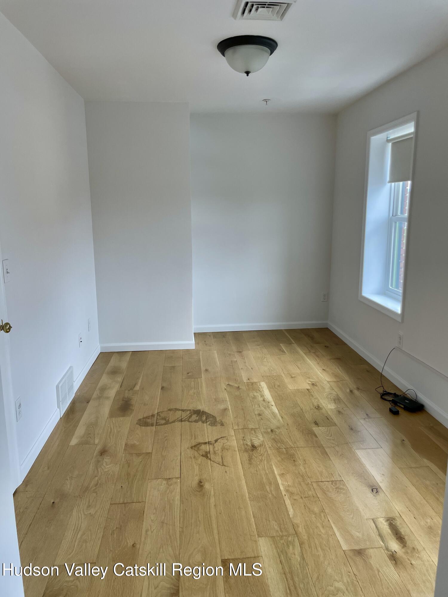 202 Warren Street, Unit 2 Hudson, NY 12534 - Photo 15 of 17 a view of empty room