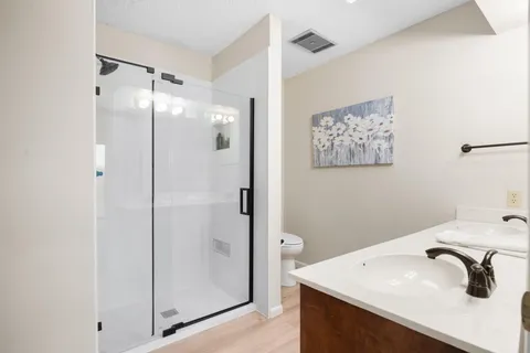 a bathroom with a sink and mirror