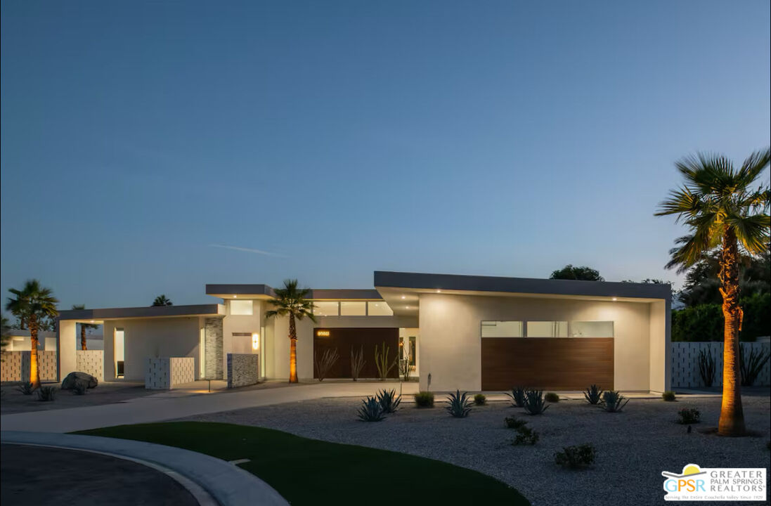 80883 Elemento Lane Indio, CA 92201 - Photo 3 of 47 a front view of a house with a yard