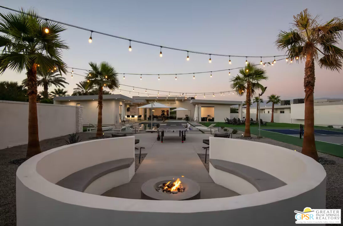 80883 Elemento Lane Indio, CA 92201 - Photo 39 of 47 a view of swimming pool with outdoor seating and a patio