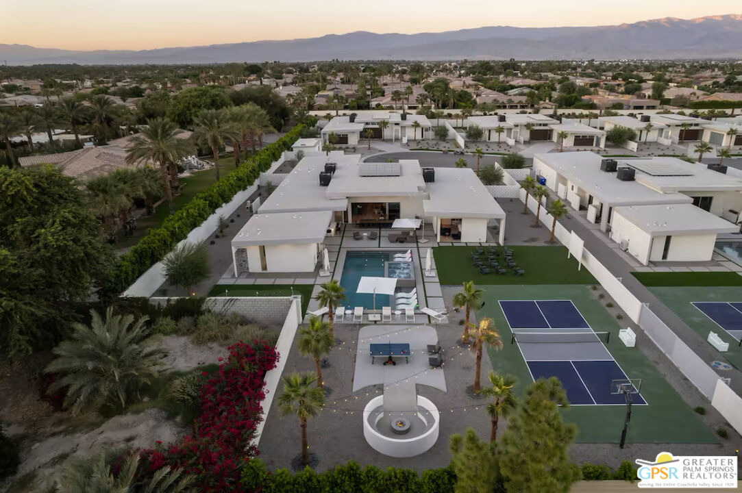 80883 Elemento Lane Indio, CA 92201 - Photo 41 of 47 an aerial view of multiple houses with a yard