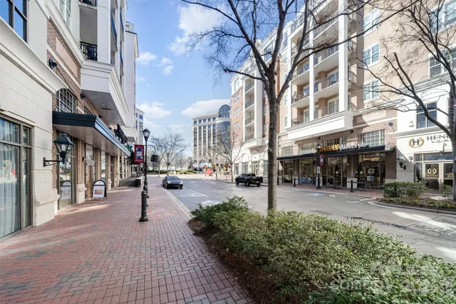 a view of a building with sitting area