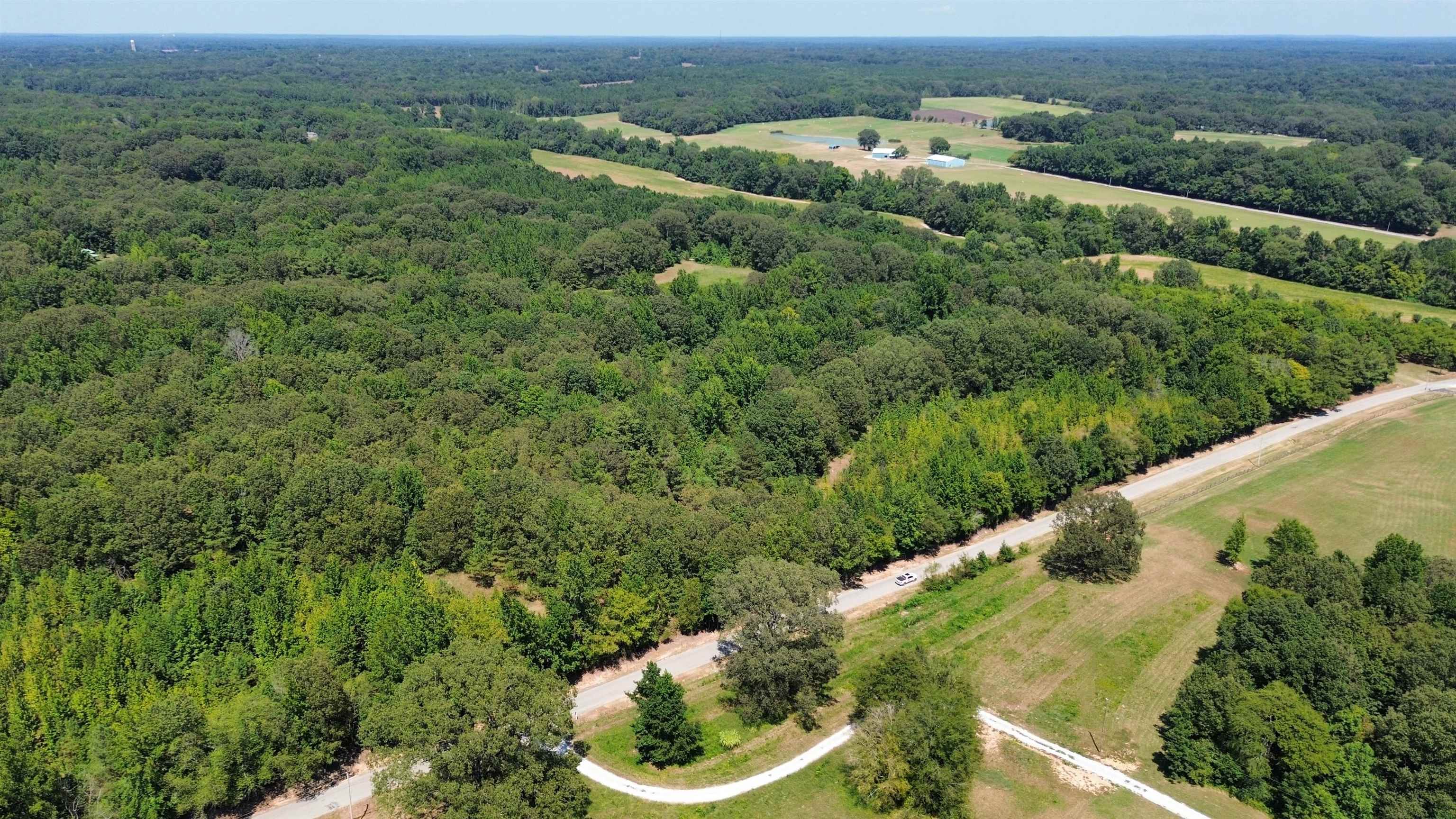 2730 Price Road Moscow, TN 38057 - Photo 2 of 5 an aerial view of a houses with a yard