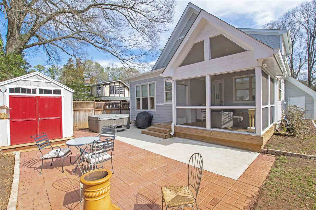 Vaulted Screen Porch off of the kitchen w/ adjoining patio