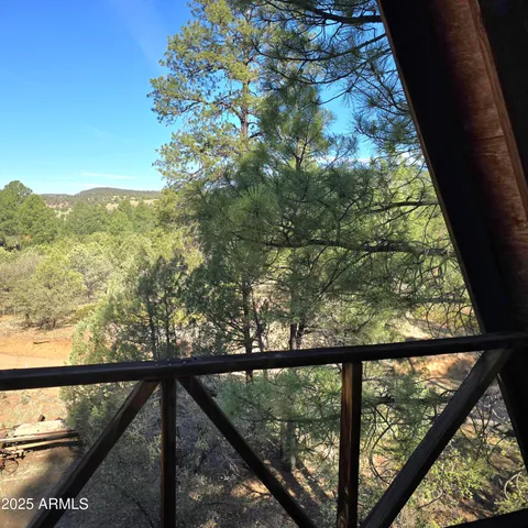 a building with trees in the background