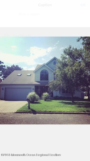 a view of a yard with an ocean