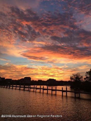 1615 Calamus Place Point Pleasant, NJ 08742 - Photo 2 of 2 a view of chairs and table in wooden floor