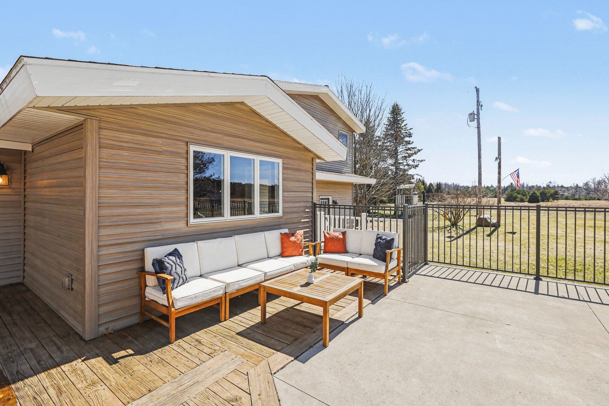 4786 Red Apple Road Manistee, MI 49660 - Photo 34 of 47 Back Patio