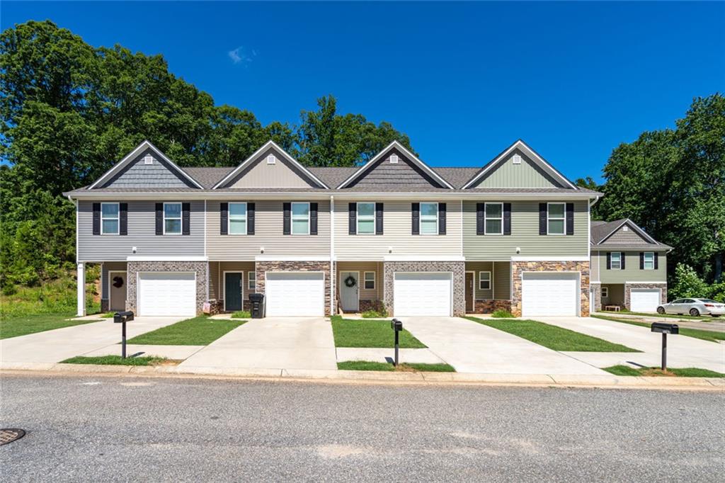 front view of a house with a small yard