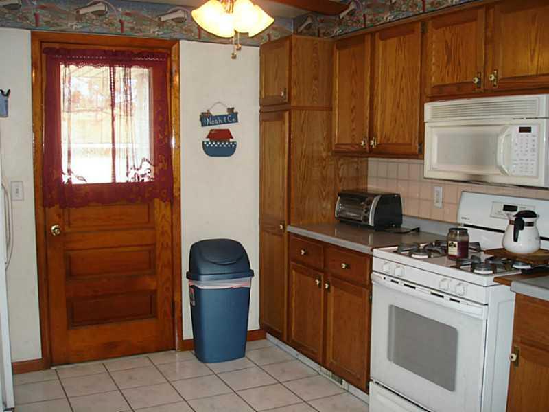 1049 Silver Lane McKees Rocks, PA 15136 - Photo 6 of 16 Kitchen. Right Side - Door accesses Deck.