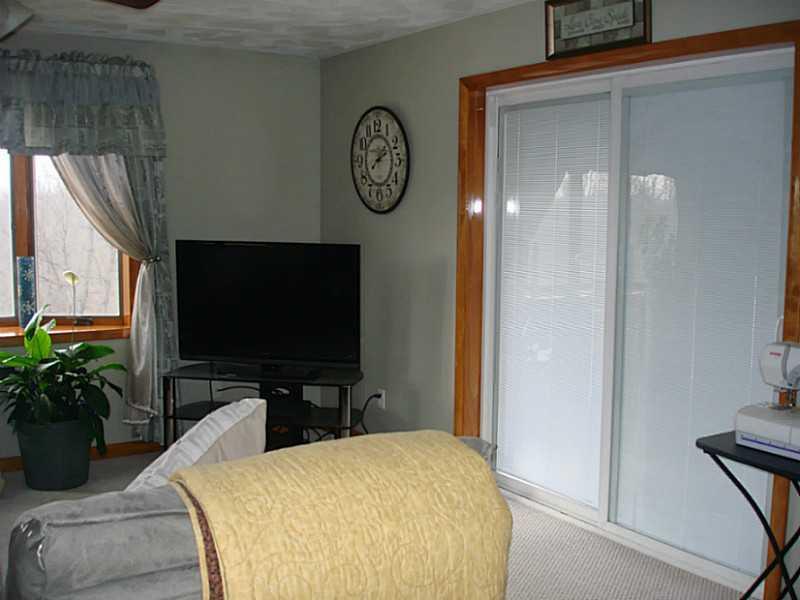 1049 Silver Lane McKees Rocks, PA 15136 - Photo 8 of 16 Family Room. Sliding Door accesses Deck.