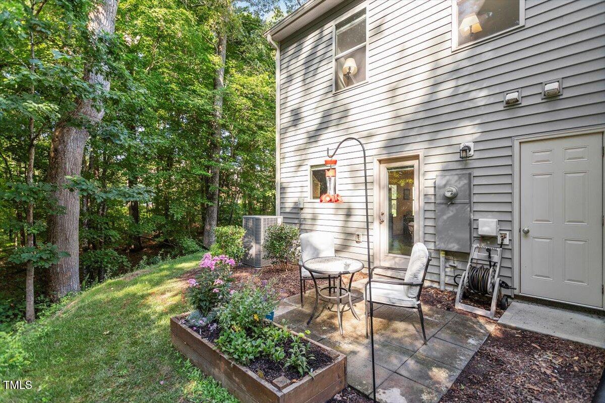 534 Hobkirks Place Durham, NC 27704 - Photo 29 of 34 a view of a backyard with sitting area