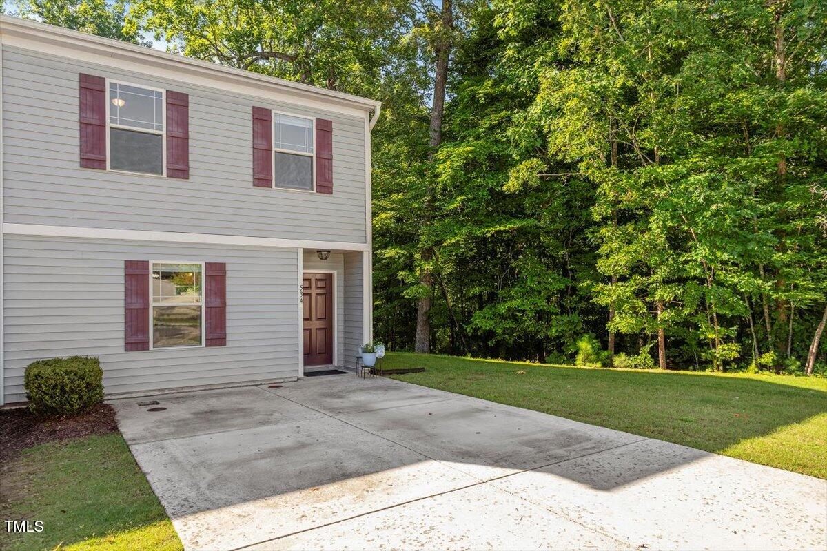 534 Hobkirks Place Durham, NC 27704 - Photo 3 of 34 a view of a house with a yard