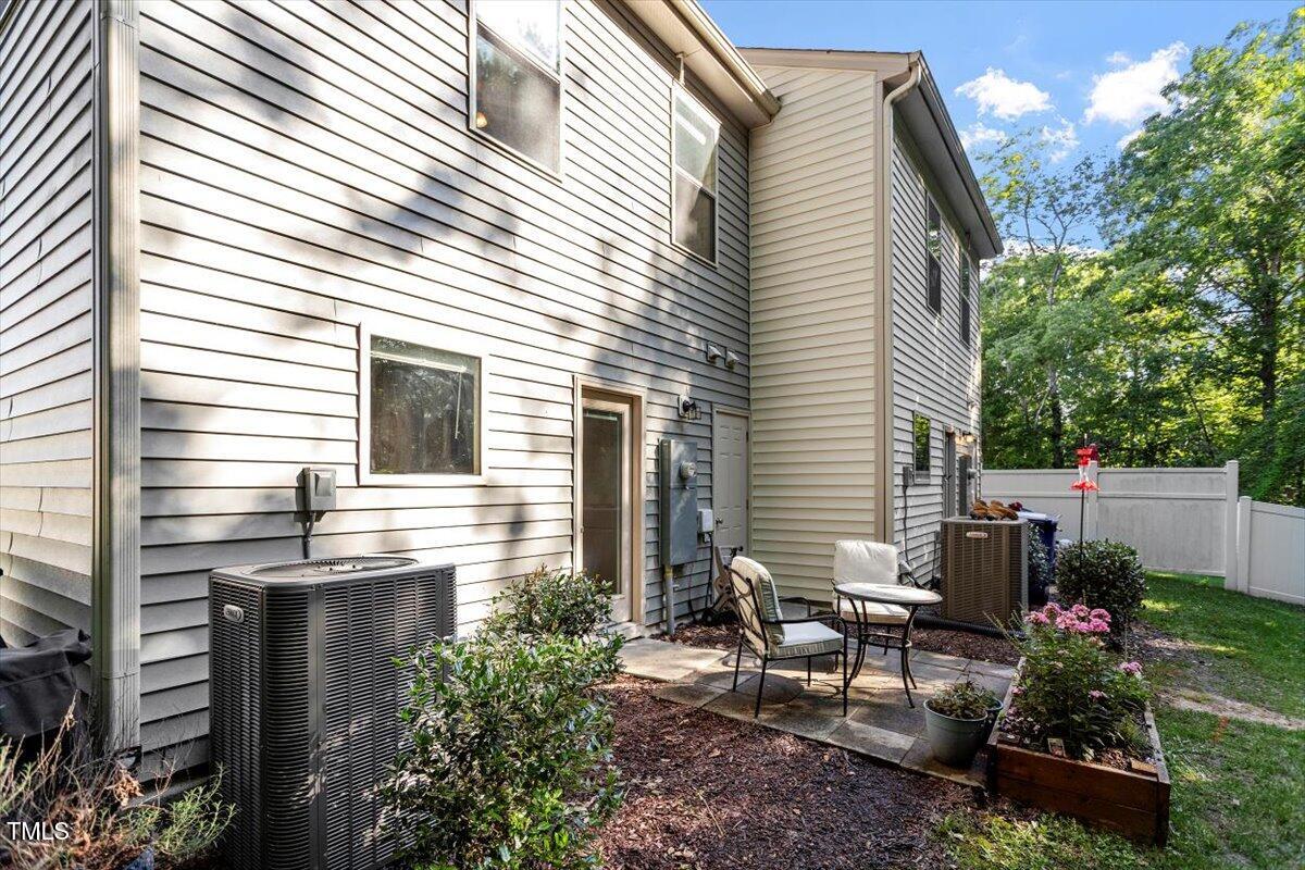 534 Hobkirks Place Durham, NC 27704 - Photo 32 of 34 a view of a backyard with sitting area