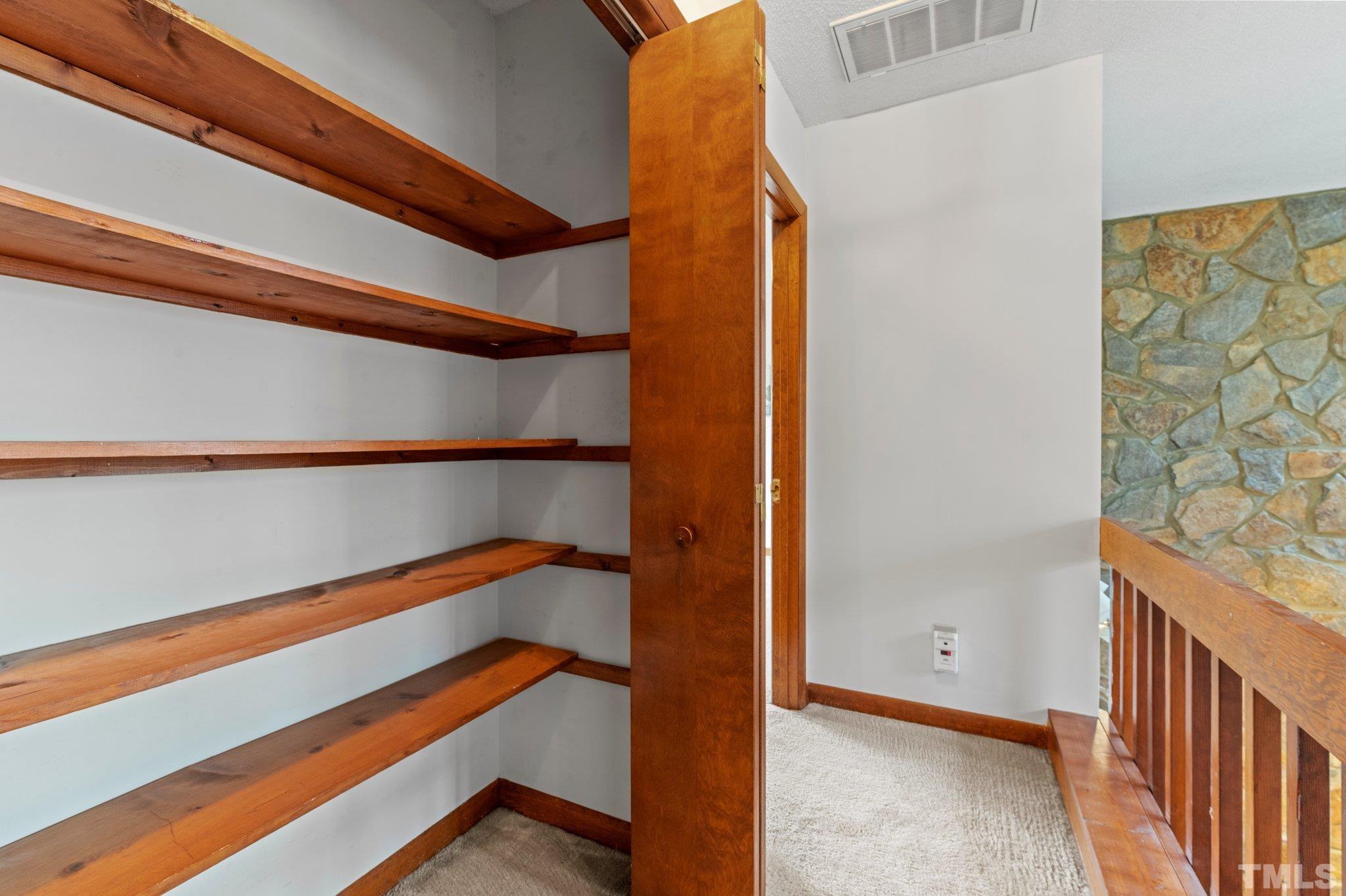 7829 Breckon Way Raleigh, NC 27615 - Photo 24 of 40 a view of a room with stairs