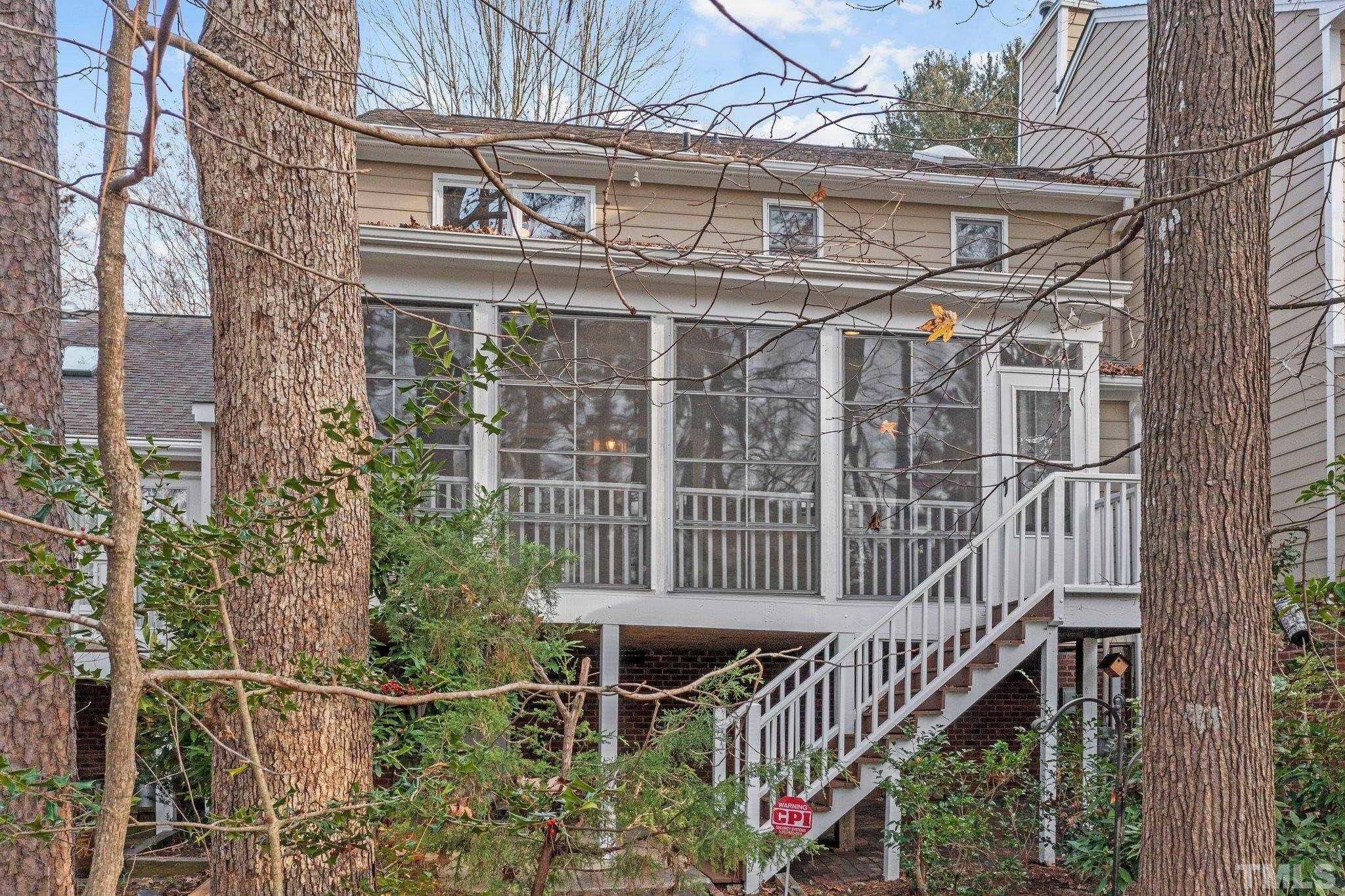 7829 Breckon Way Raleigh, NC 27615 - Photo 28 of 40 front a house with a deck and furniture