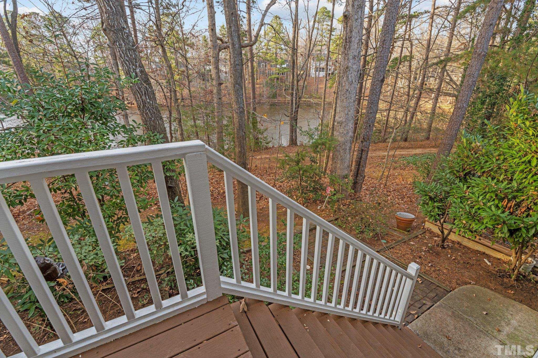 7829 Breckon Way Raleigh, NC 27615 - Photo 29 of 40 a view of a balcony with wooden floor
