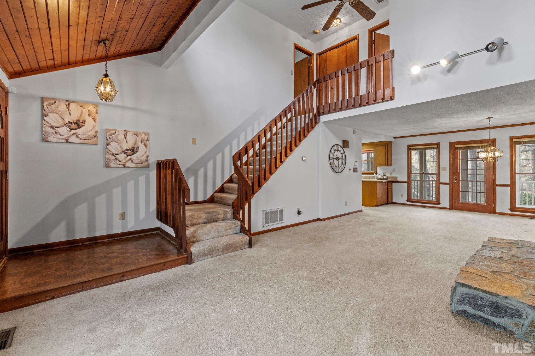 7829 Breckon Way Raleigh, NC 27615 - Photo 5 of 40 a view of an entryway with workspace