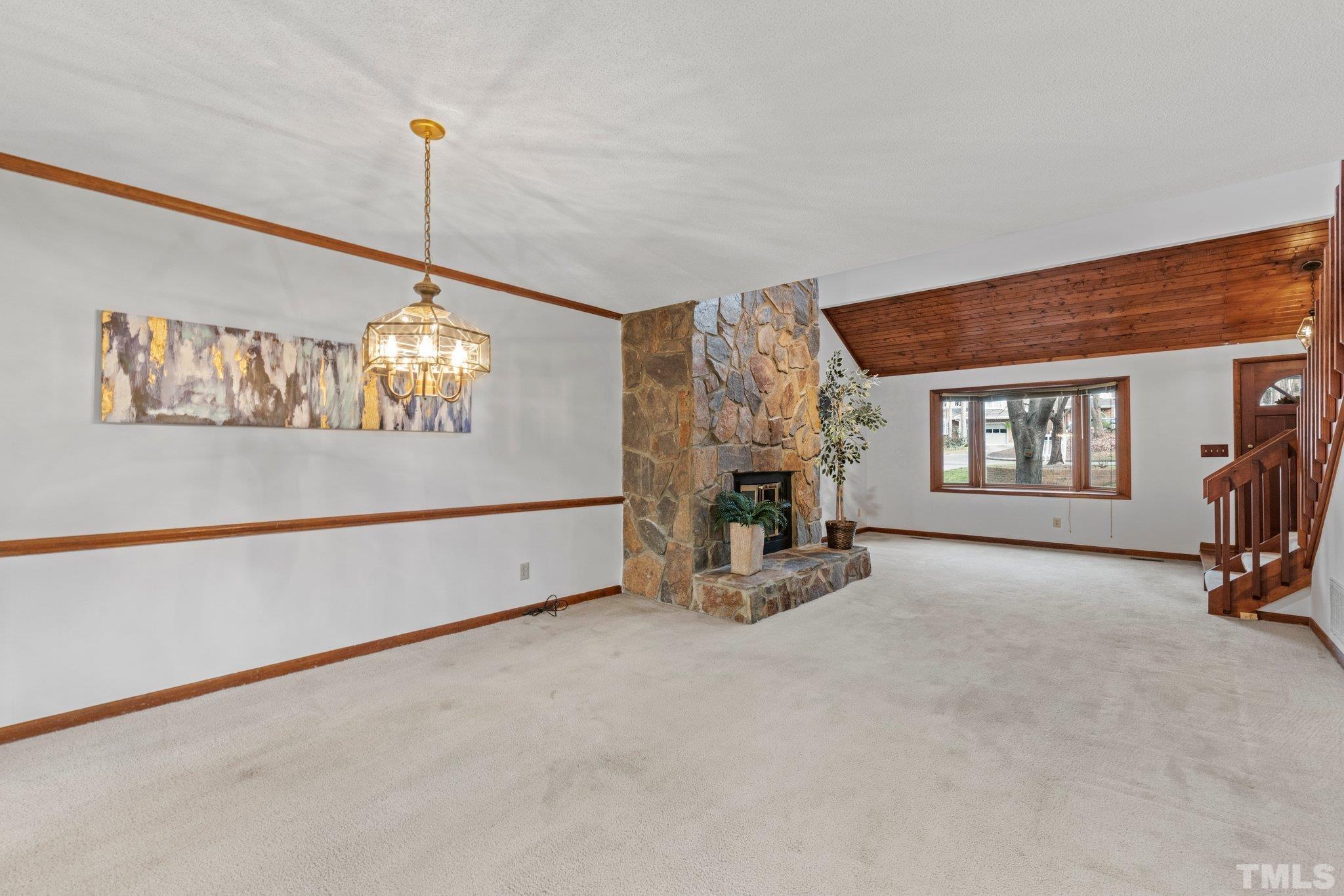 7829 Breckon Way Raleigh, NC 27615 - Photo 6 of 40 a view of an empty room with a window