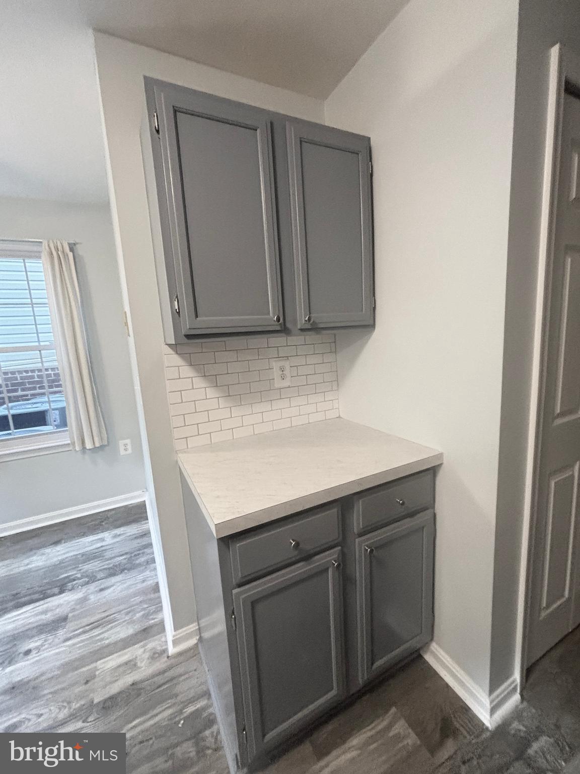 307 Tall Pines Court, Unit 3 Abingdon, MD 21009 - Photo 20 of 52 a kitchen with a sink and a microwave