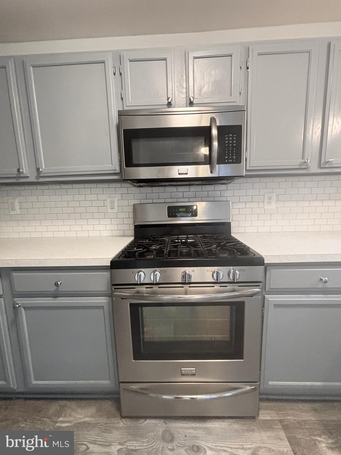 307 Tall Pines Court, Unit 3 Abingdon, MD 21009 - Photo 22 of 52 a stove top oven sitting inside of a kitchen