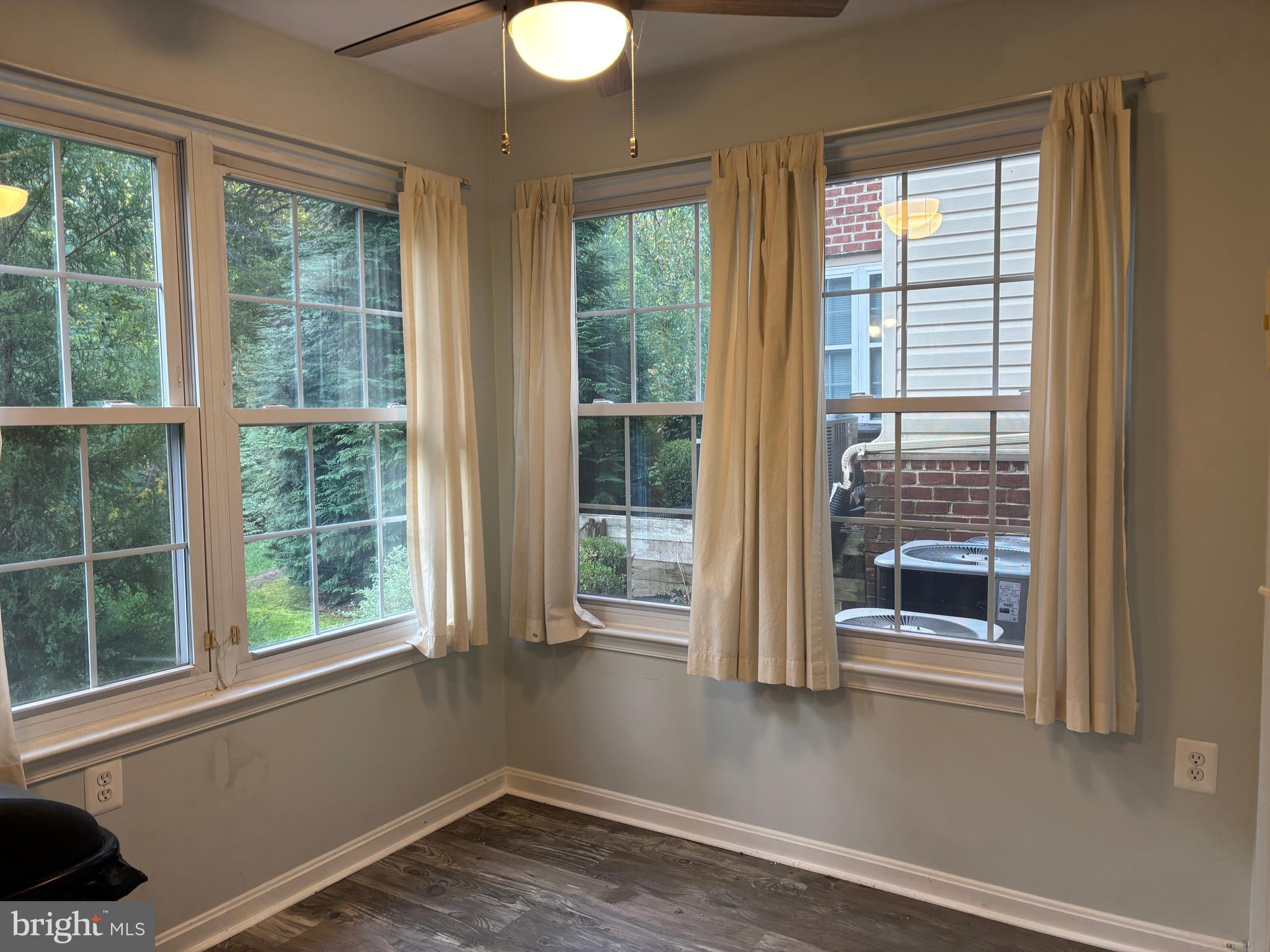 307 Tall Pines Court, Unit 3 Abingdon, MD 21009 - Photo 24 of 52 a view of wooden floor and windows in a room