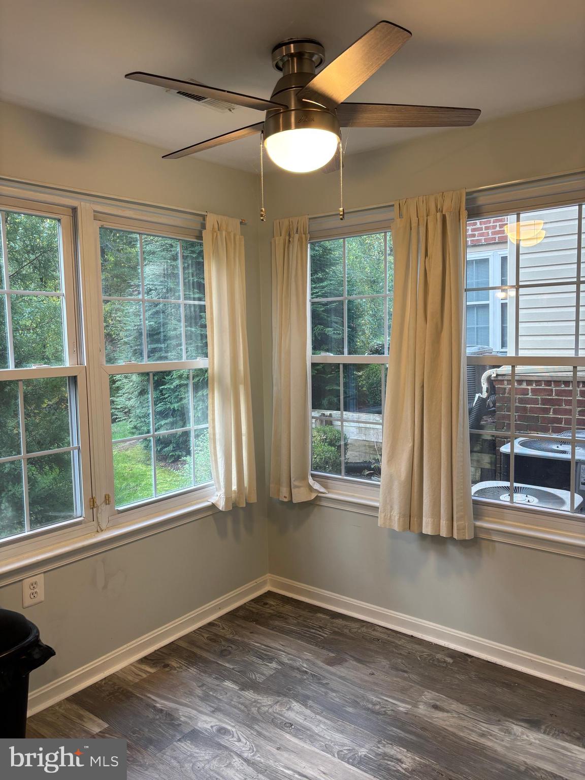 307 Tall Pines Court, Unit 3 Abingdon, MD 21009 - Photo 25 of 52 a view of empty room with wooden floor and fan
