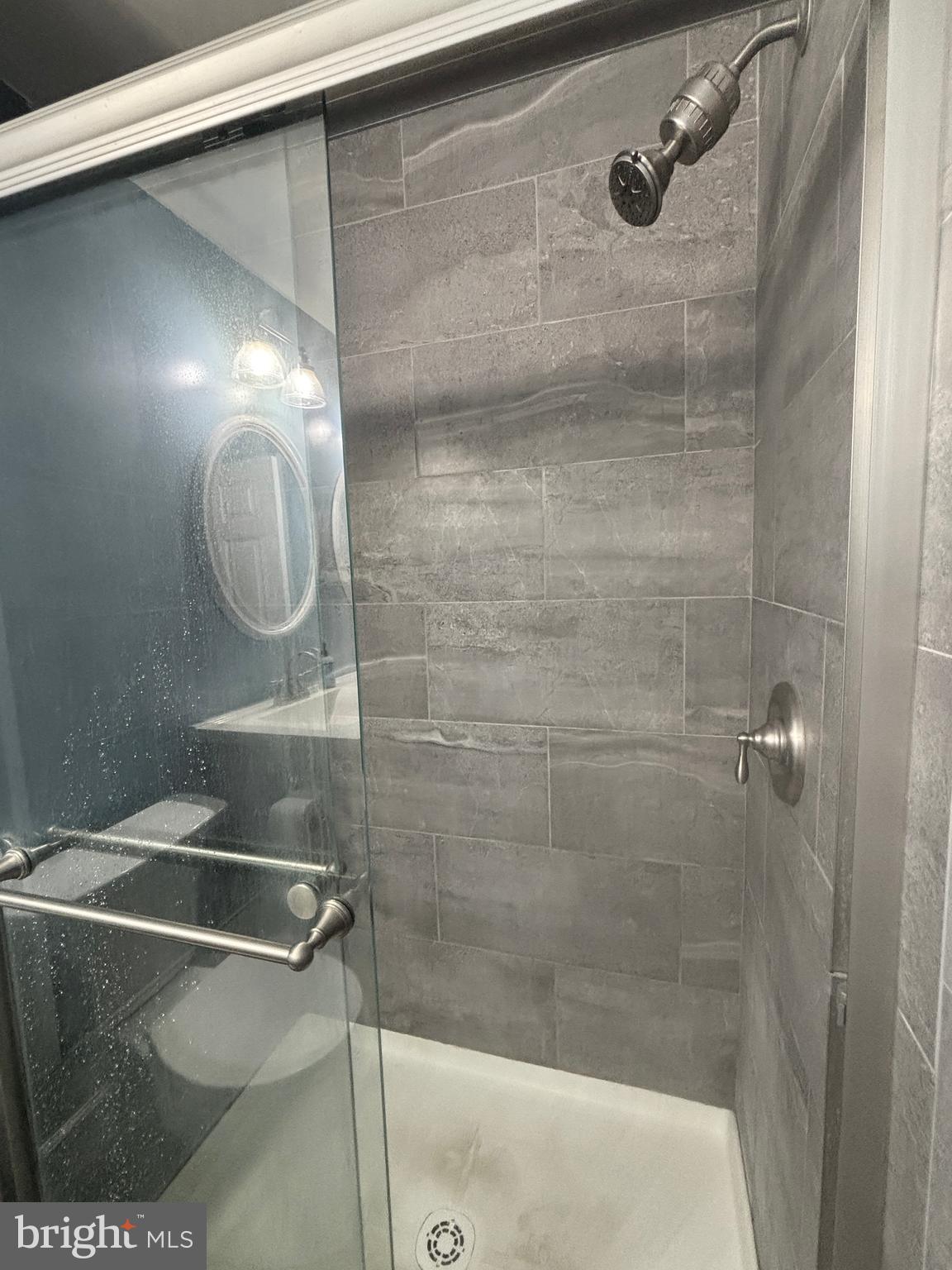 307 Tall Pines Court, Unit 3 Abingdon, MD 21009 - Photo 33 of 52 a bathroom with a shower and vanity